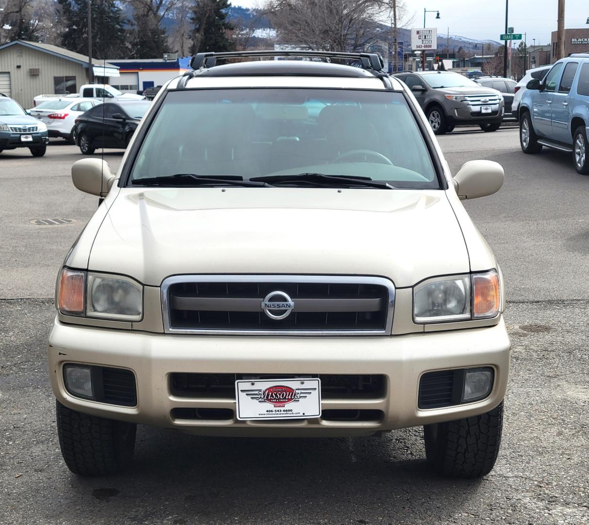 2002 Gold /Tan Nissan Pathfinder LE (JN8DR09Y22W) with an 3.5L v6 engine, Automatic transmission, located at 450 N Russell, Missoula, MT, 59801, (406) 543-6600, 46.874496, -114.017433 - 4WD SUV. 3.5L V6. Automatic Transmission. Heated Seats. Power Leather Seats. Power Sunroof. Air. Cruise. Tilt. AM FM CD Player. Power Windows and Locks. Because of the age, Financing is not available on this vehicle. - Photo#2